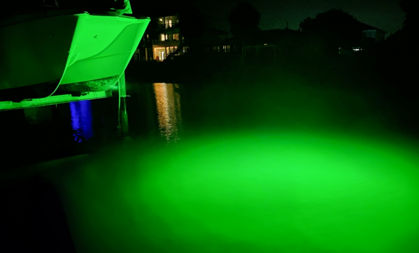 A green colored underwater LED dock light.