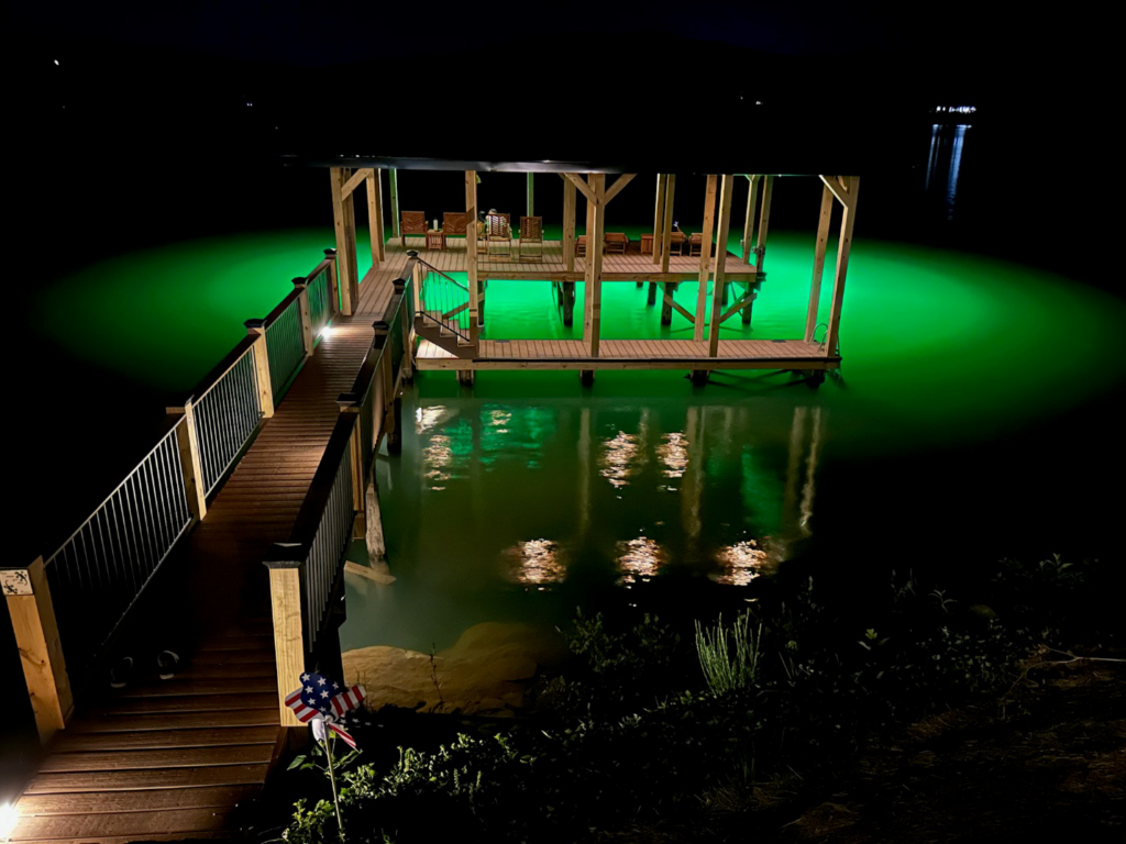 Green colored dock lighting for fishing at night. 